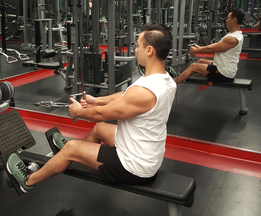 Rebuild Physiotherapy Eric Lau demonstrating how to perform a seated cable back row