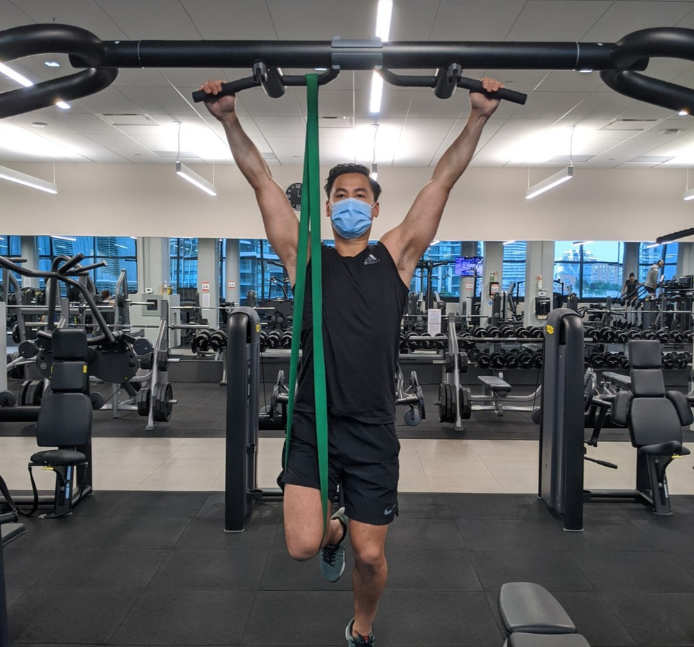 Unload your weight during a pull up by using a resistance band