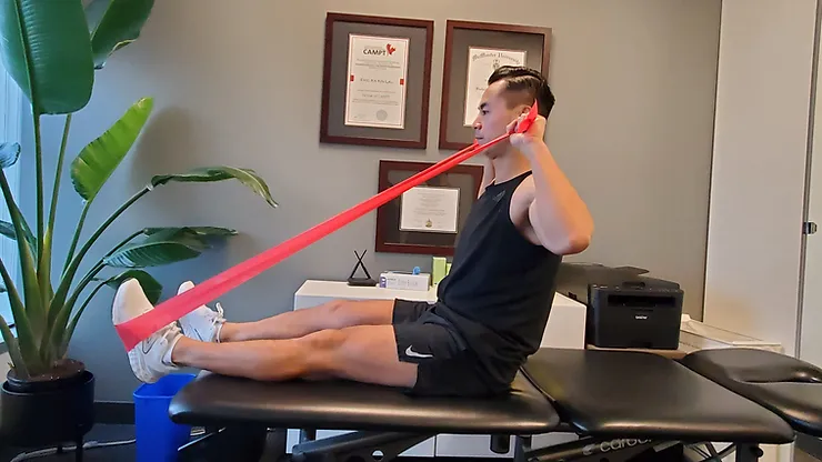 Physiotherapist Eric Lau demonstrating a face pull exercise.