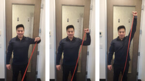 Bryan Chen doing 90/90 shoulder external rotation to overhead press exercise. This exercise is a rehab exercise for shoulder bursitis and shoulder tendonitis.