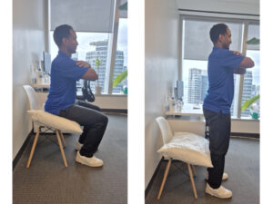 Physiotherapist Najih Ismail is demonstrating a sit to stand squat exercise to rehabilitate a meniscus injury in the knee.